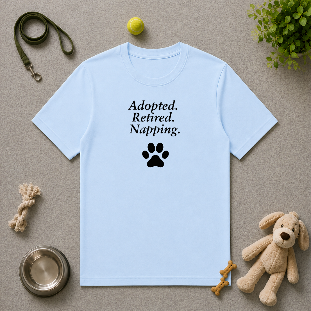 Paw Prints on Our Hearts – Adopted. Retired. Napping. - Unisex T-Shirt